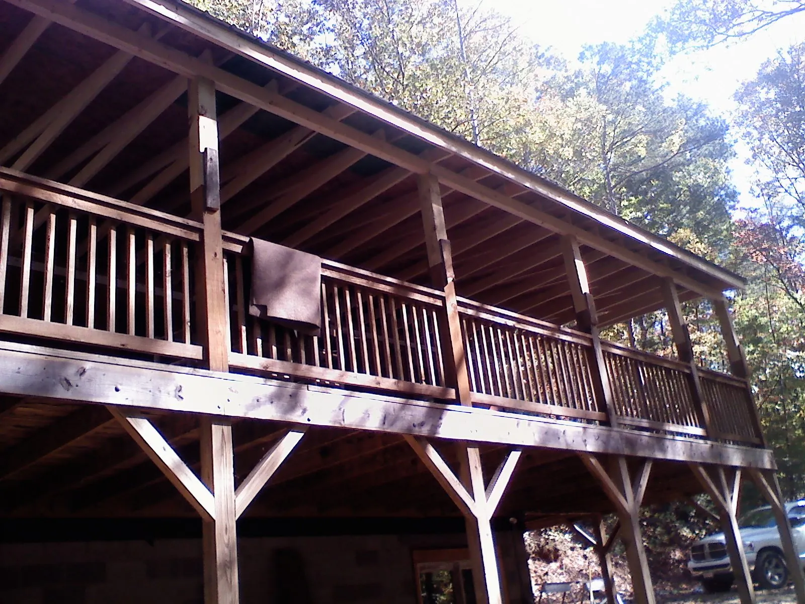 Timber framing under a new elevated porch and deck — Roof Leak Repair in East Islip by Roofing Brothers